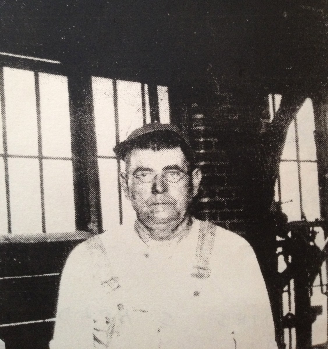 James Solomon HOLDER in overalls at blacksmith shop