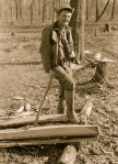 Man resting after chopping wood
